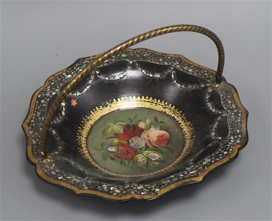 A Victorian papier mache basket, with central floral panel diameter 23cm